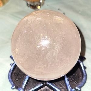 Clear quartz sphere loaded with rainbows and flash